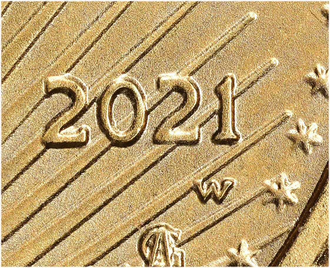 A close-up of the W mint mark from the recently discovered 2021-W $10 Gold Eagle Struck from Proof Dies